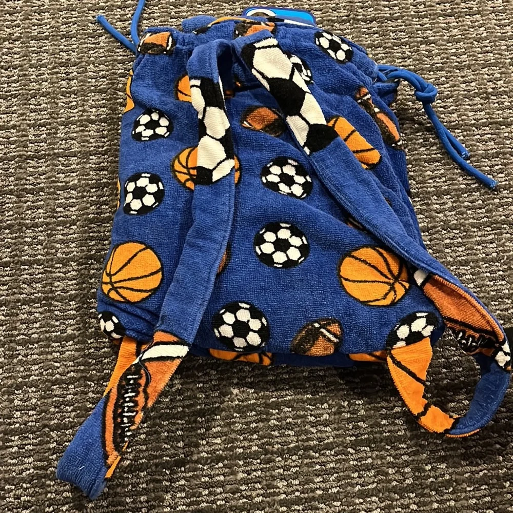 Beach towel backpack sports theme. Towel size 30”x60”. New